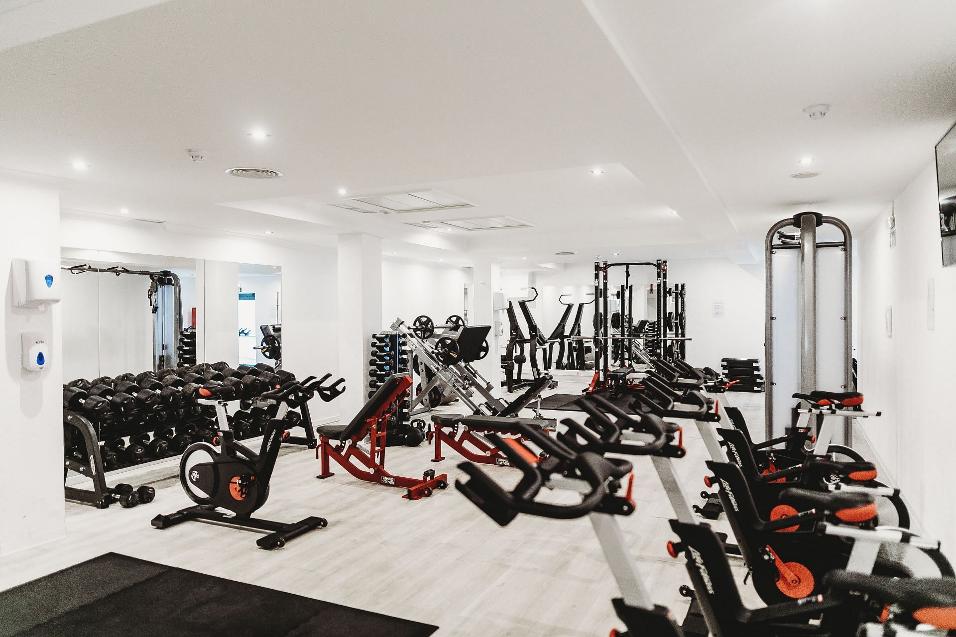 Leg curls can be performed using a resistance band or machine. (Image via Unsplash/ Humphrey Muleba)